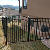 Black aluminum fence and gate